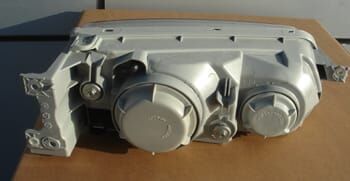 HYUNDAI STAREX- MİNİBÜS- 98/08; FAR LAMBASI SOL MANUEL/ŞEFFAF CAMLI (H1/H7) (FAMELLA)